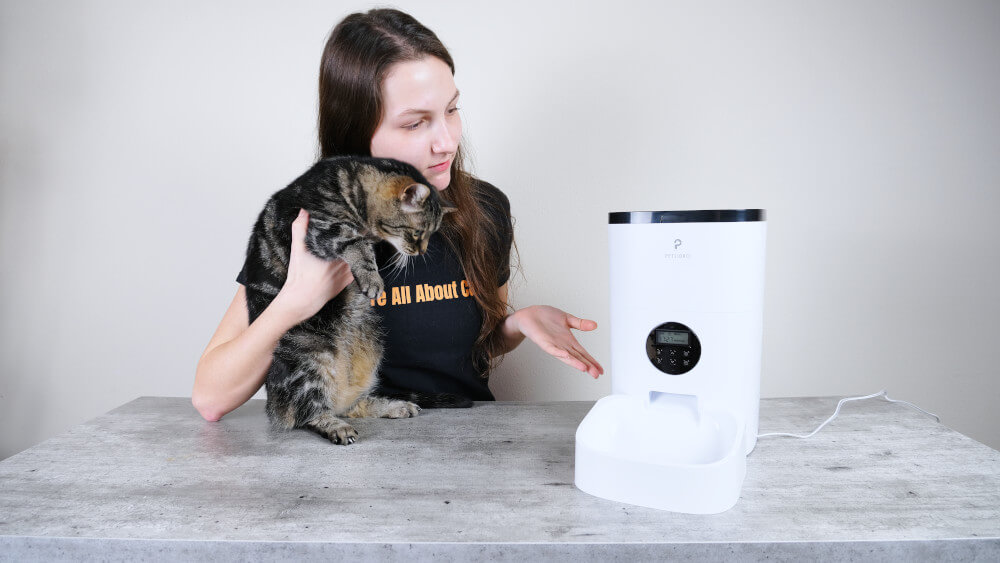 Showing Forest the Petlibro automatic cat feeder