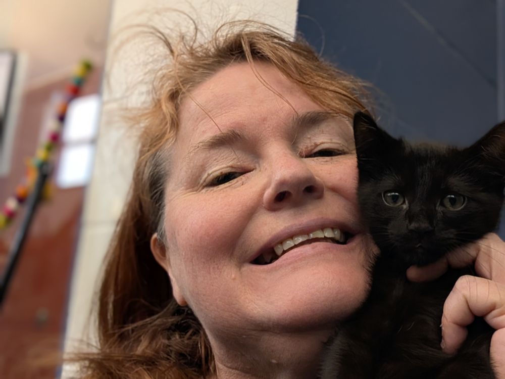 Kellie with a shelter kitten