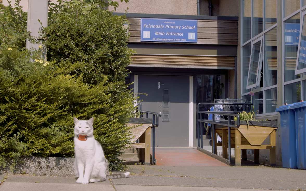 kiki in front of kevindale primary school